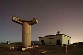 One of the remaining TTR bases at SF-88C. High Power Acquisition Radar (HIPAR) building in the background.