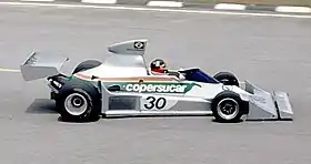 In its first years, Fittipaldi raced with a silver livery with Brazil's national colors, this is Emerson 'Emmo' Fittipaldi driving his FD04