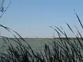 Lake Cospuden today. Viewing direction northwards with the towers of Leipzig in the background