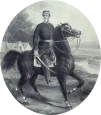 Lithograph depicting a man wearing a military kepi and frock coat with sword in hand and mounted on a black horse