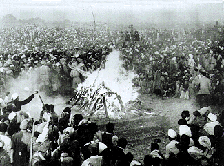 Cremation of Mahatma Gandhi at Rajghat, 31 January 1948. It was attended by Jawaharlal Nehru, Lord and Lady Mountbatten, Maulana Azad, Rajkumari Amrit Kaur, Sarojini Naidu and other national leaders. His son Devdas Gandhi lit the pyre.