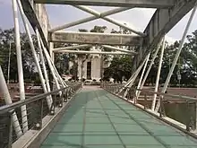 bridge which runs over the Crescent Lake.