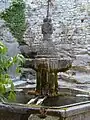 Fountain in the hilltop village of Crestet, in the Vaucluse (1588)