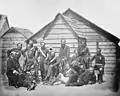 Crimean War, [Group of soldiers outside a hut], c. 1855