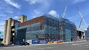 Picture of Crows Nest station under construction from street level.