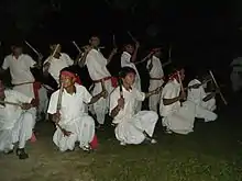 Tharu men performing Lathi Nach