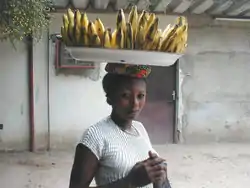 Image 9A woman carrying bananas. (from Culture of the Democratic Republic of the Congo)