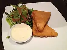 Image 37Fried cheese, served with tartar sauce and side salad (from Czech cuisine)