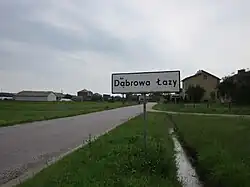 Road sign to Dąbrowa-Łazy