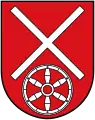 Gules a fillet saltire couped argent above a wheel of the same (Klein-Winternheim)