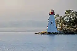 The Kidston Island Lighthouse which also appears on the village seal.