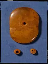 Amber disc and beads, Battle Axe culture, Denmark