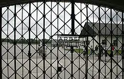 The main gate at Dachau concentration camp, marked with the slogan Arbeit macht frei