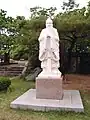 Statue of Confucius on complex grounds