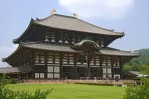 Image 68The Daibutsu-den, within the complex of Tōdai-ji. This Buddhist temple was sponsored by the Imperial Court during the Nara period. (from History of Japan)