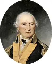 A head-and-shoulders portrait. Morgan is in a brigadier's uniform (one star on the shoulder epaulet), blue jacket with gold facing. He is balding with white hair, and stares without expression over the viewer's right shoulder.