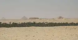 Landscape around Kafr Ammar, with the Bent and Red pyramids of Sneferu, Mastabat al-Fir'aun, and Pyramid of Pepi II visible in the background