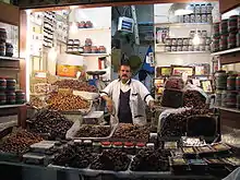 Image 2A date vendor in the old souq in Kuwait City