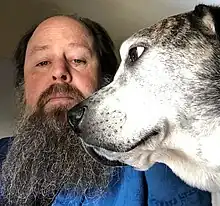 David Bentley Hart and his dog Roland.