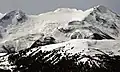 Mount Davidson (left), Mount Carr (center) above Cheakamus Glacier, and Castle Towers Mountain (right). North aspect.