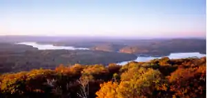 Image 28Western Maryland is known for its heavily forested mountains. A panoramic view of Deep Creek Lake and the surrounding Appalachian Mountains in Garrett County. (from Maryland)