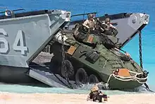 A light-armored vehicle assaults the beach from a landing craft utility from Assault Craft Unit 2 during an amphibious assault demonstration conducted as part of Bright Star 2009, Egypt, Oct. 12, 2009.