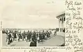 Picture post card of the Gordon Highlanders marching past King George V and Queen Mary at the Delhi Durbar on 12 December 1911, when the King was crowned Emperor of India.