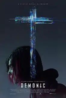 "US theatrical release poster": A man's face is covered by a glitch-style cross.