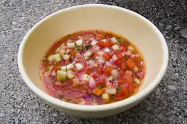 Portuguese Gazpacho prepared with diced ingredients