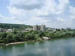 Image 16A view of Otaci, which is located on the southwestern bank of the Dniester River, which at that point forms the northeastern border of Moldova, July 2006. Here Otaci is seen from the Ukrainian town of Mohyliv-Podilskyi. The tower block in the foreground collapsed in 2019.