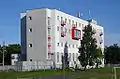 Modern tower block in Bolderāja. Former warehouse.