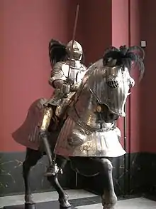 Statue of horse and rider in armour