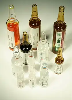 collection of glass bottles of different sizes