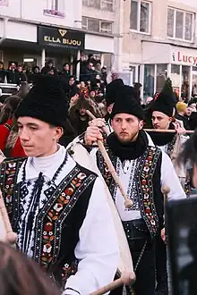 Image 31Romanian "tamburași" drummers in traditional clothing (from Culture of Romania)