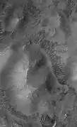 Sand dunes often form in low areas (Mars Global Surveyor).