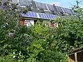 Solar PV panels and solar hot water panels combined on rooftop