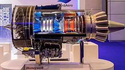 Honeywell F124 jet trainer/light combat aircraft turbofan showing HP compressor with 4 axial and centrifugal last stage with high backsweep, splitter blades and leading edge sweep. Overall pressure ratio 19.4:1 from 3 axial fan, 4 axial HP and 1 centrifugal.