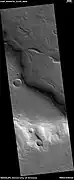 Glaciers moving form valleys in a mesa, as seen by HiRISE under HiWish program