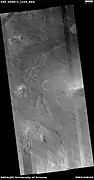 Wide view of pits and dust devil tracks, as seen by HiRISE under HiWish program