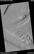 Streamlined shapes formed by flowing water, as seen by HiRISE under HiWish program