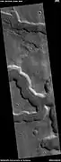 Example of frettered terrain, as seen by HiRISE under HiWish program  Fretted terrain contains many wide, flat-floored valleys.