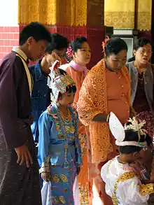 Image 33An ear-piercing ceremony at Mahamuni Buddha in Mandalay. (from Culture of Myanmar)