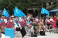 The Kökbayraq at an East Turkestan independence event in Washington D.C.