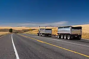 Truck transport going east on Highway 2, near Waterville