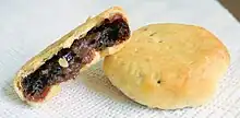 Image 16Eccles cake is a small round flaky pastry cake filled with currants, sugar and spice. It is native to Eccles. (from Greater Manchester)