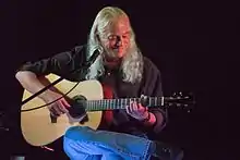 Ed Gerhard playing a Breedlove dreadnought guitar at the Canadian Guitar Festival in 2014