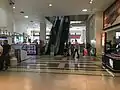 Escalators on the first floor of the current mall.