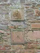 Movable stone blocks in the old heated wall of the walled garden.