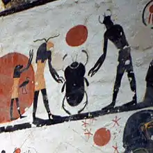 Painting of Khepri holding the sun.