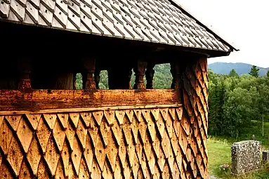 Detailed view of the wooden shingle facade